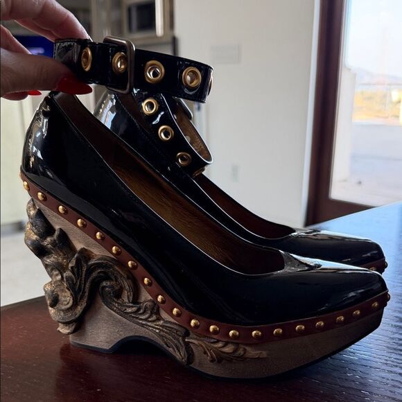 Miu Miu Shoes - Miu Miu Black Heels with Sculpted Gold Accents